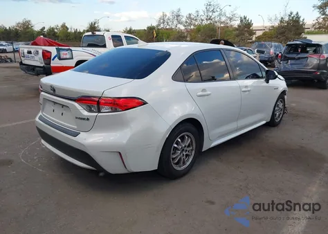 2021 Toyota Corolla Hybrid Le from USA, damaged, VIN JTDEAMDE9MJ002619